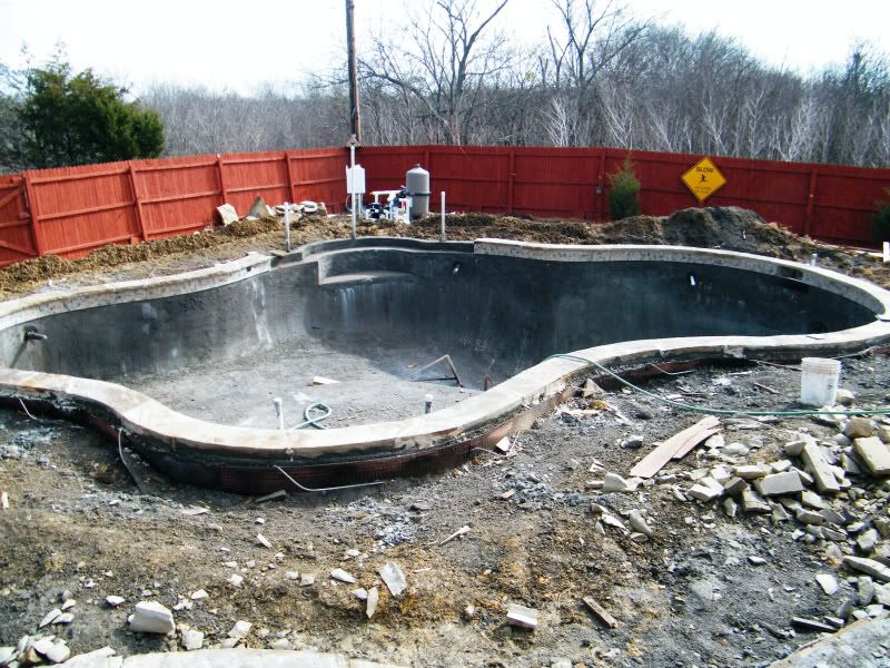 Retaining Wall Pool Ideas elegant rectangular pool photo in baltimore with natural stone pavers Close Up Of Tile And Coping Retaining Wall Pool Ideas pros matching capstone over brick steps and wall cons overhang might cause problems for Close Up Of Tile And Coping